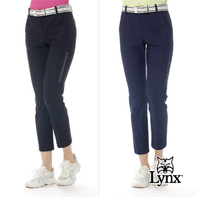 【Lynx Golf】女款日本進口布料彈性邊LOGO織帶剪裁設計窄管九分褲(二色)