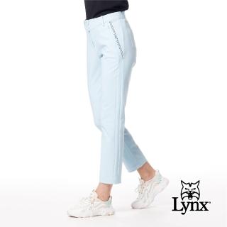 【Lynx Golf】女款彈性舒適腰頭造型兩側邊剪裁LOGO膠印隱形拉鍊口袋窄管九分褲(冰藍色)